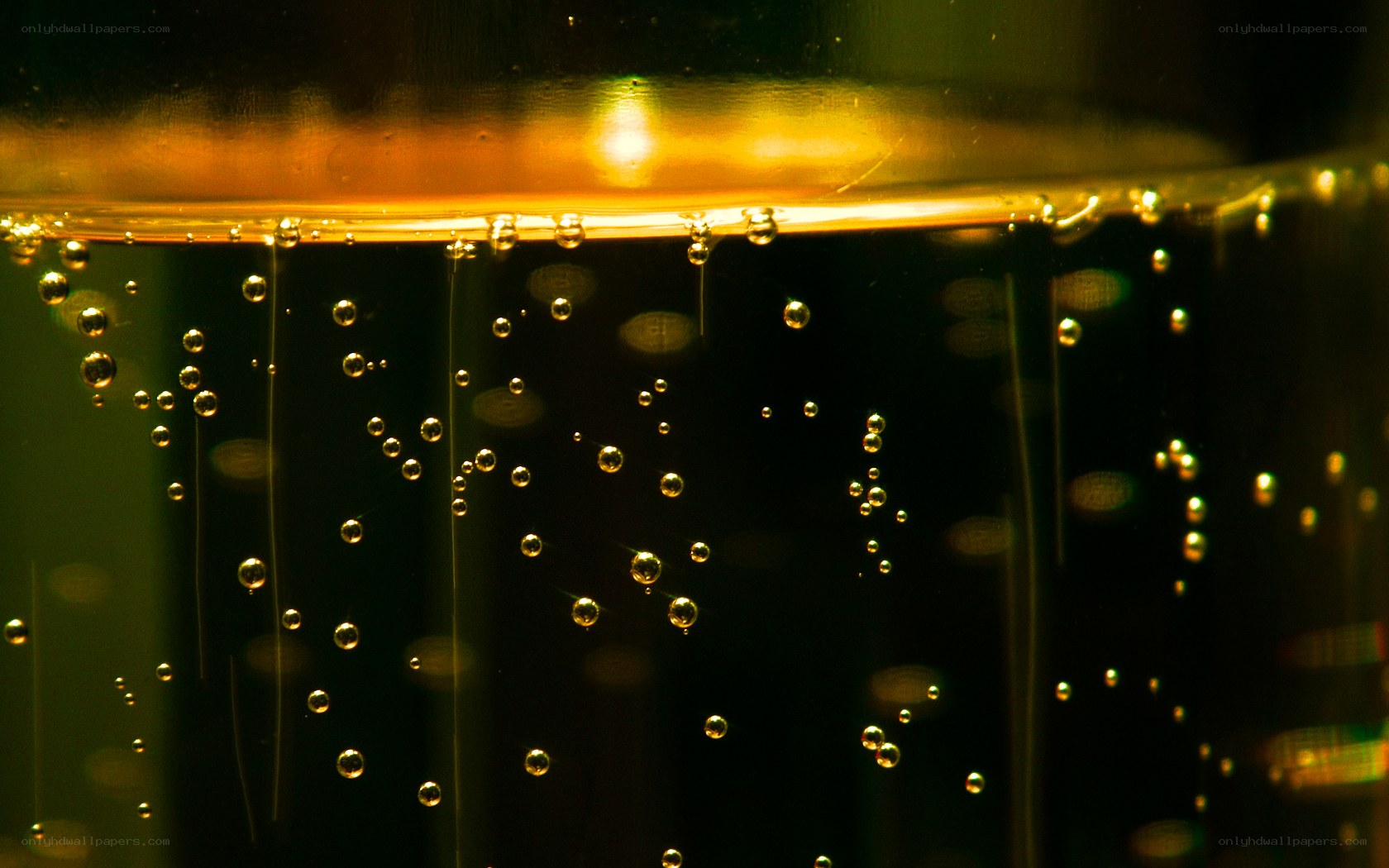 bubbles in golden liquid