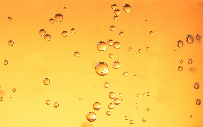 Bubbles in Liquid — Yellow, Calm, Photograph