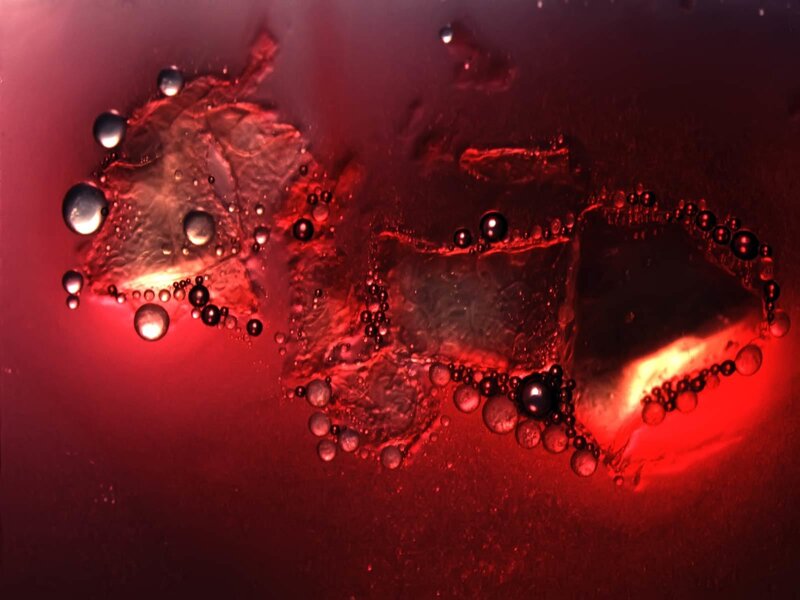 Bubbles in Red Liquid — Dramatic, Photograph