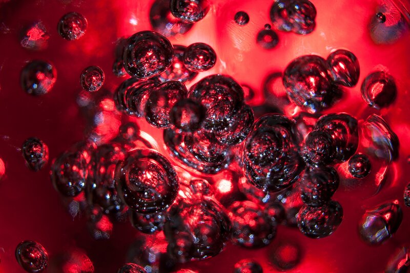 Bubbles in Red Liquid — Dramatic