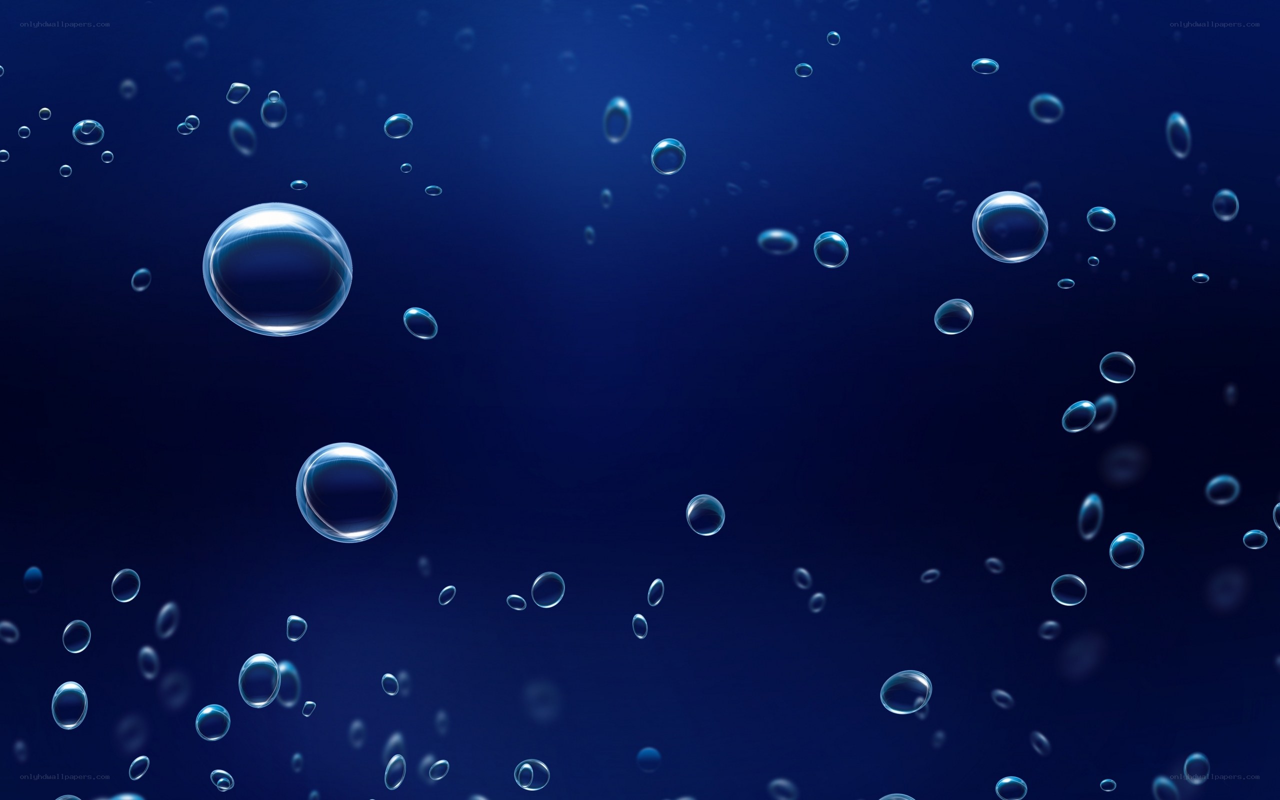 bubbles rising in blue water