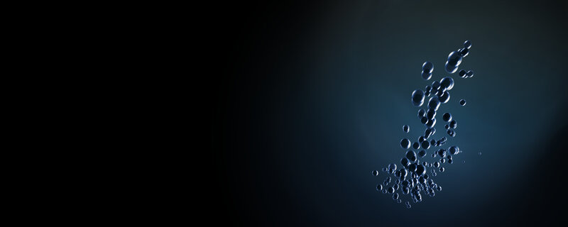 bubbles rising in dark water