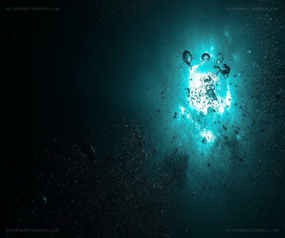 bubbles rising in dark water