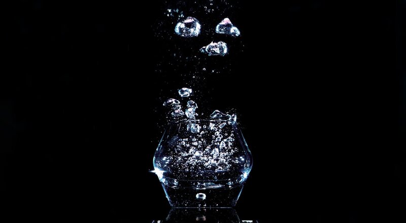 Bubbles Rising in Glass