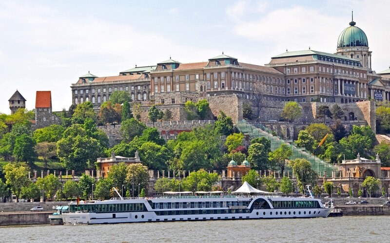 Buda Castle and river cruise ship