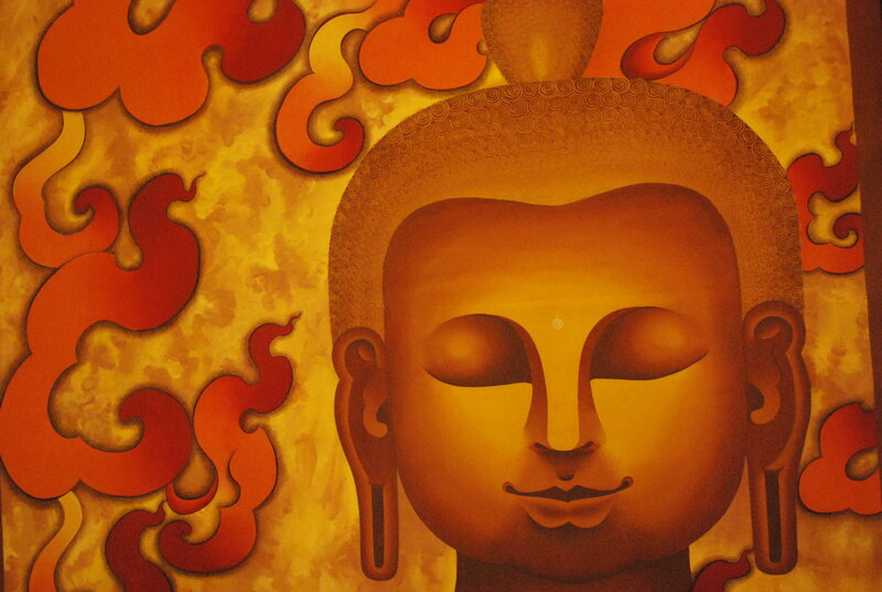 Buddha head with flame background