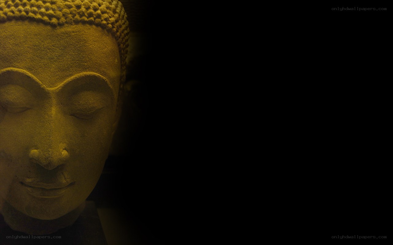 Buddha statue in dim light