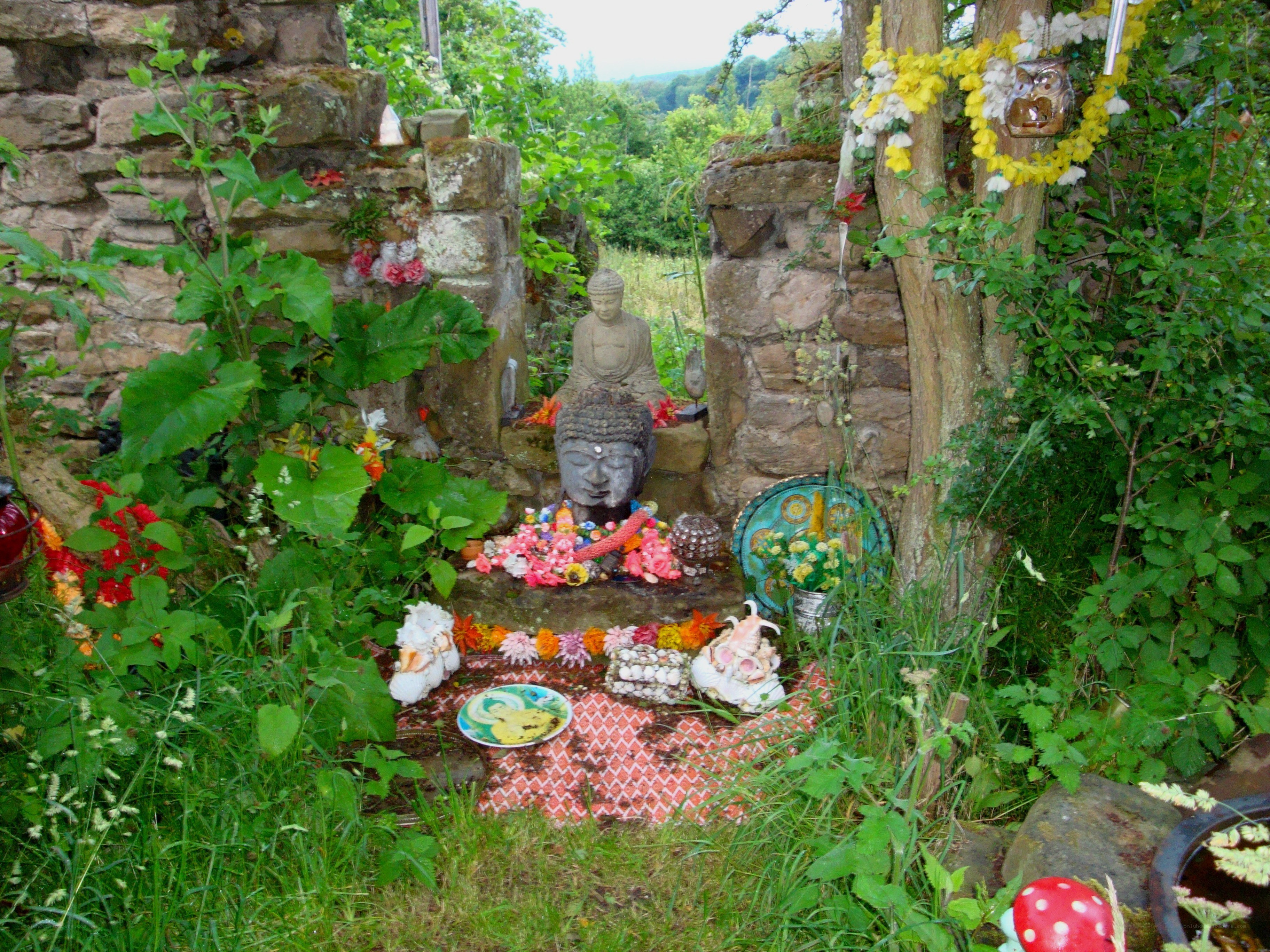 Buddha statue in garden shrine