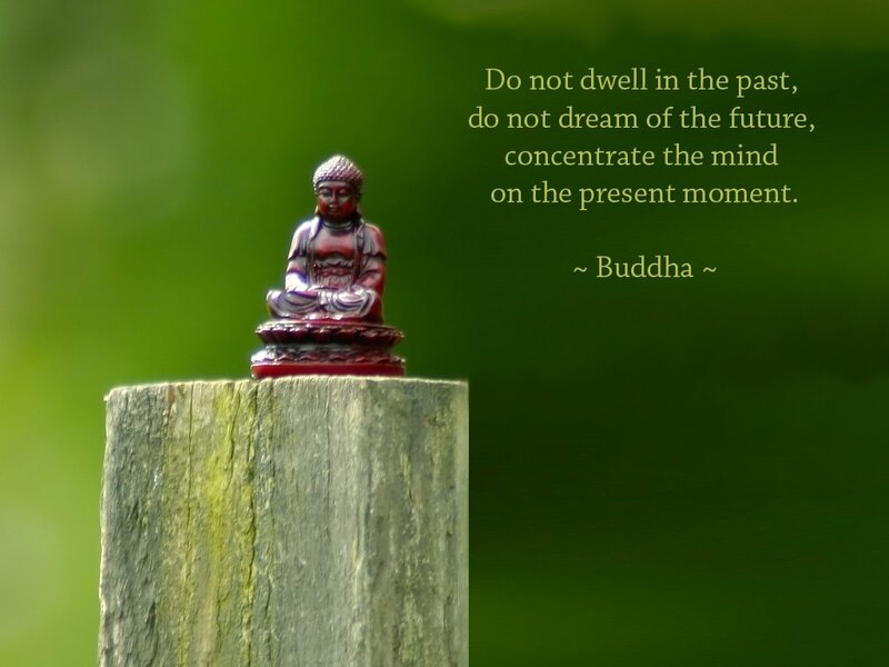 Buddha statue on a post