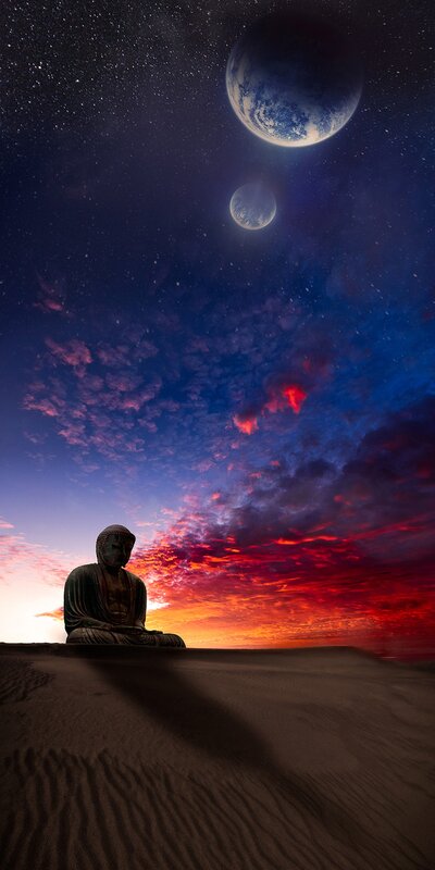 Buddha statue under alien sky