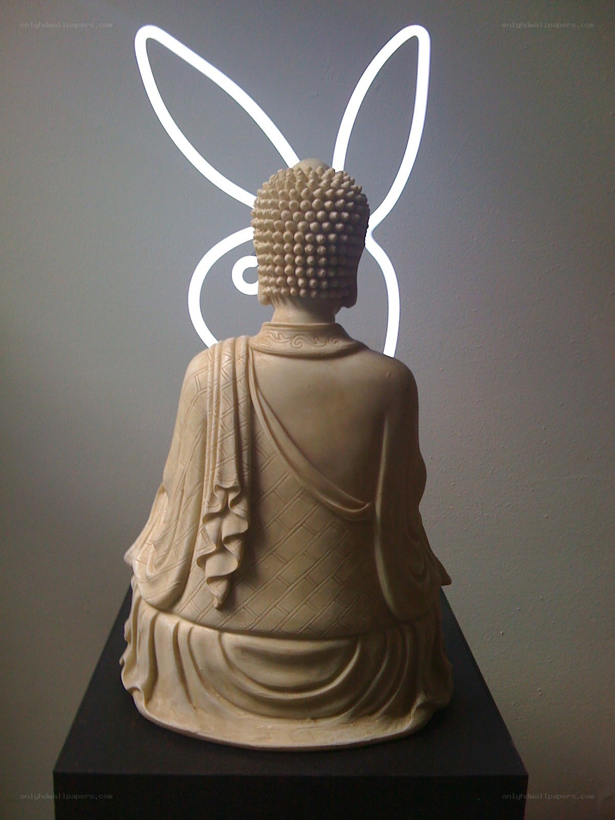 Buddha statue with bunny ears