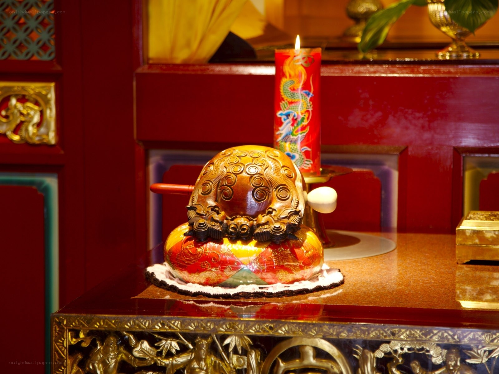 Buddha statue with candle