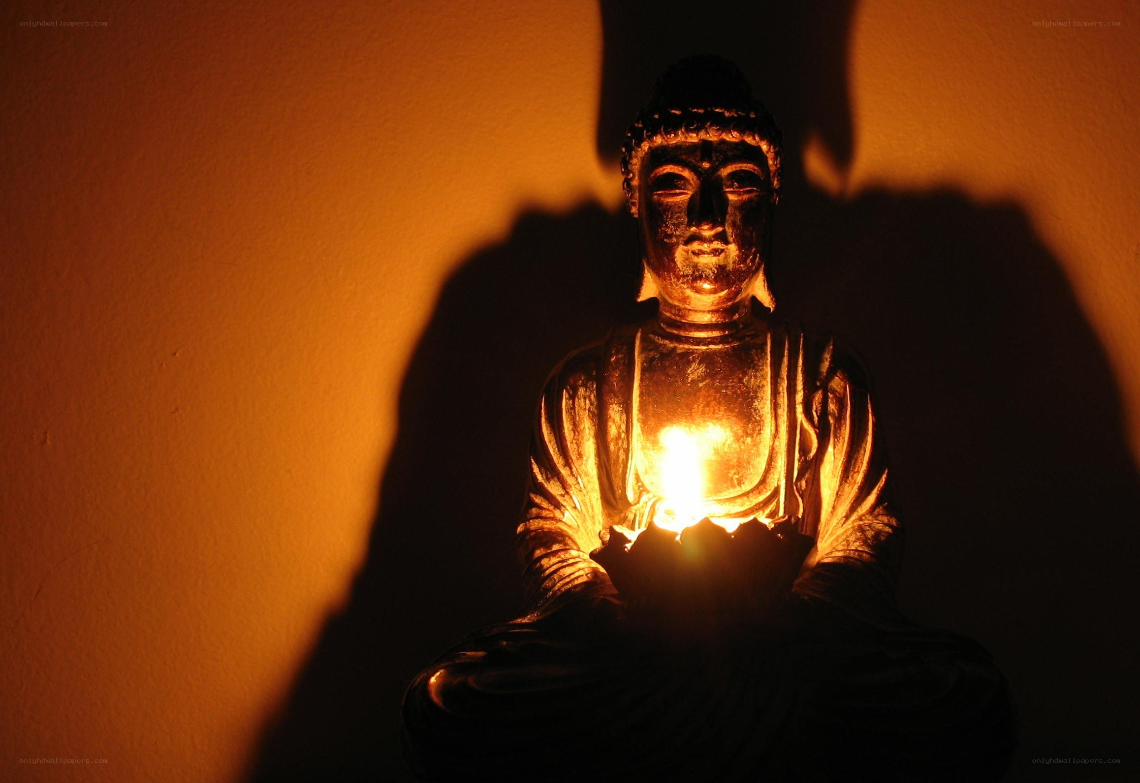 Buddha statue with candlelight