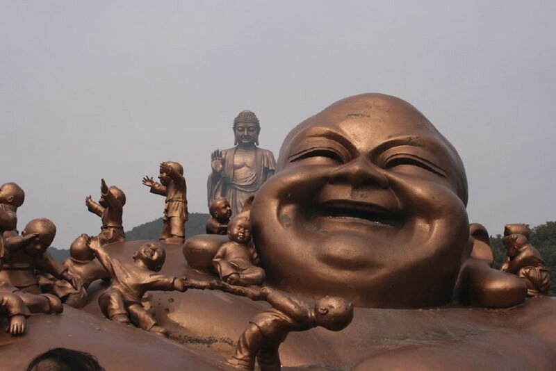 Buddha statue with children