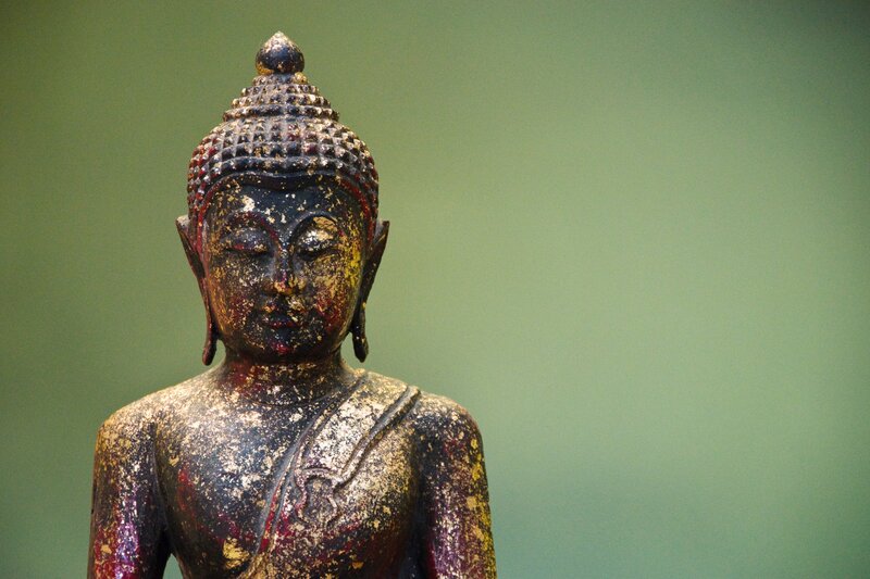 Buddha statue with gold leaf