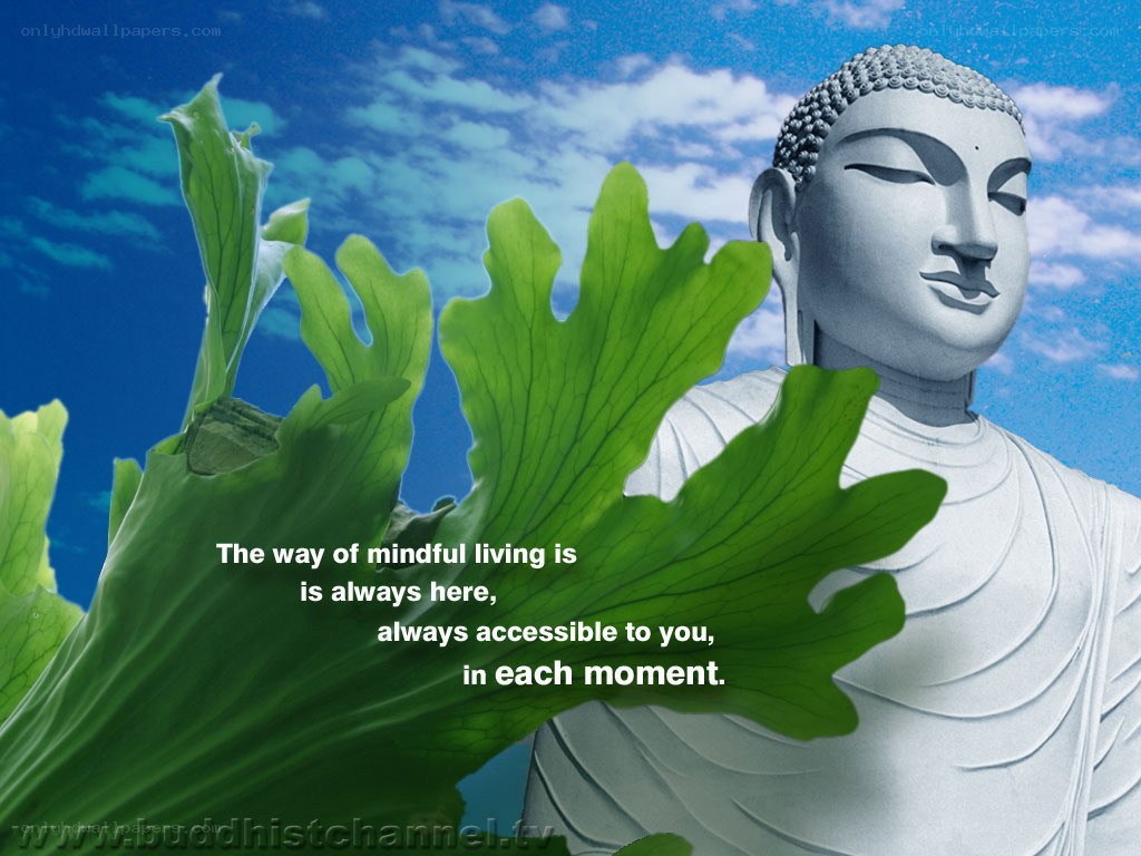 Buddha statue with green leaves