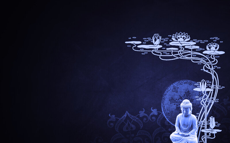 Buddha statue with lotus flowers