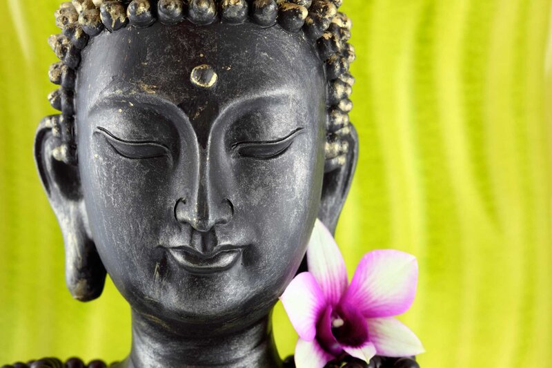 Buddha Statue with Orchid