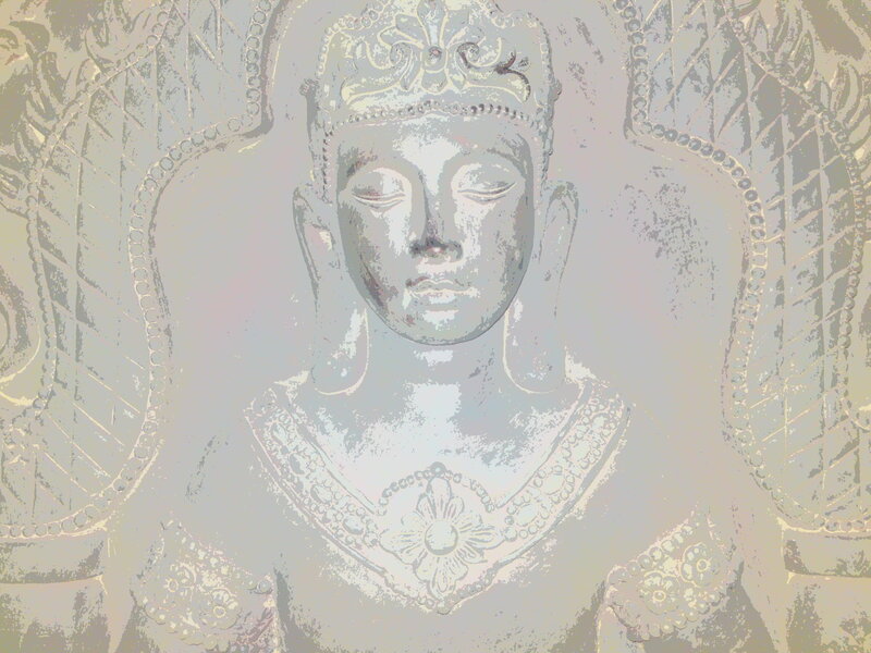 Buddha statue with ornate halo