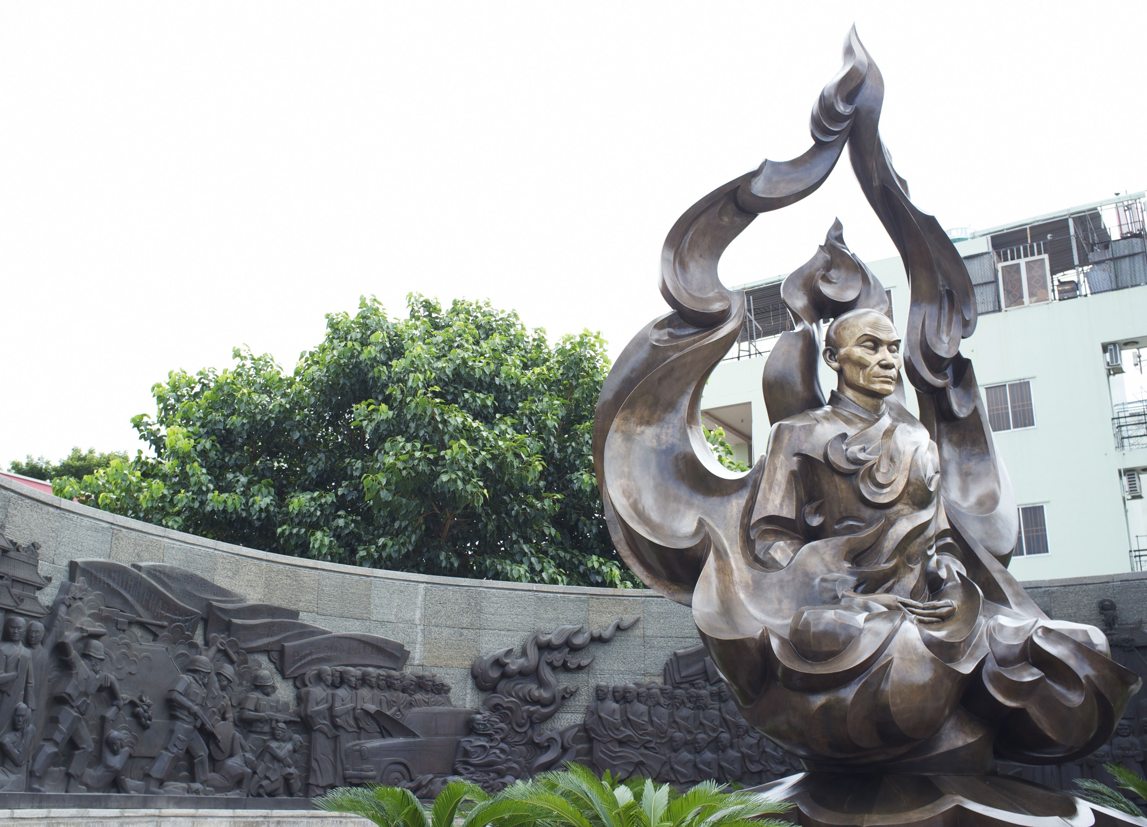 Buddhist monk statue and relief