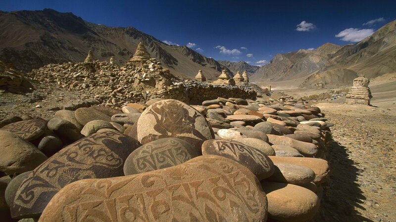 Buddhist prayer stones in mountain valley