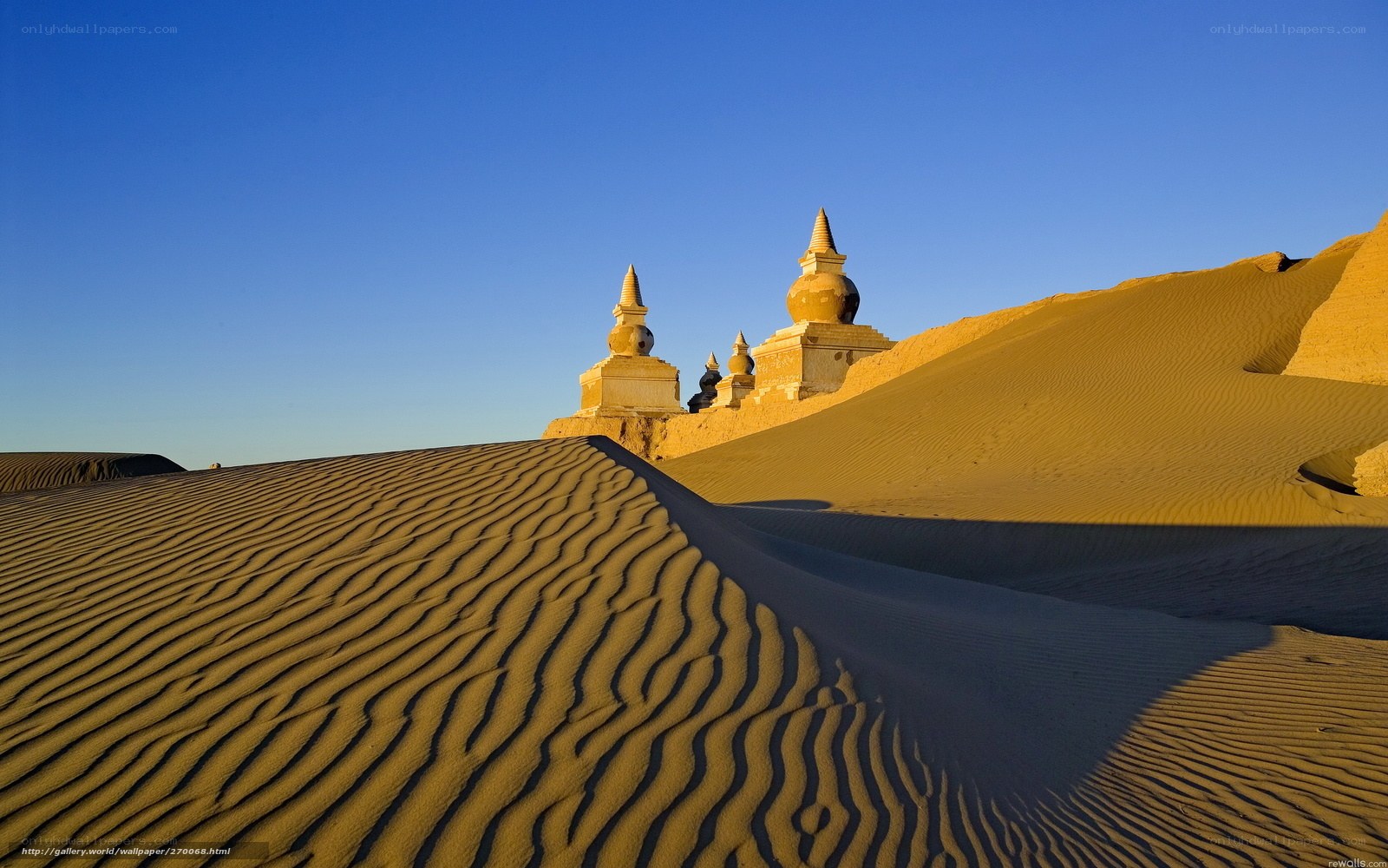 Buddhist stupas in desert sands