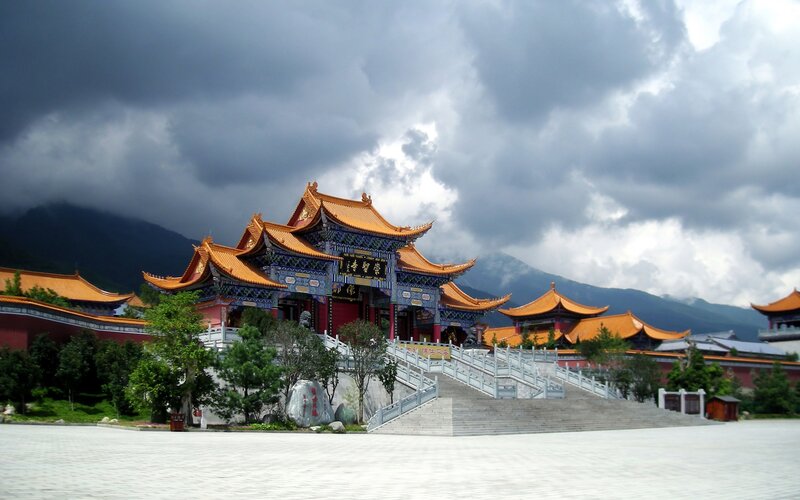 Buddhist temple with mountain backdrop