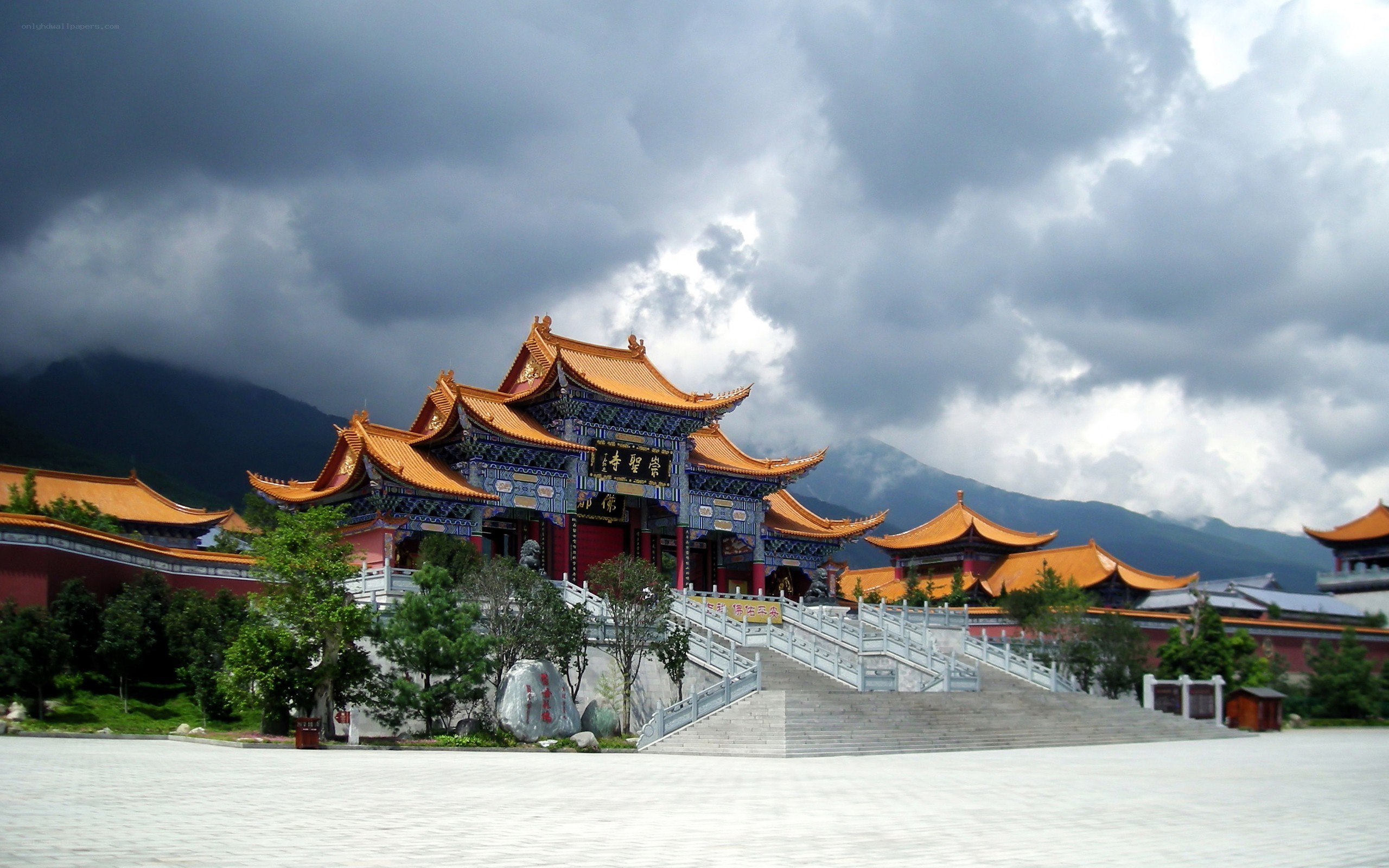 Buddhist temple with mountain backdrop