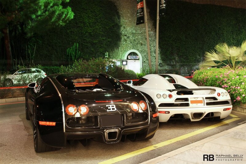 Bugatti and Koenigsegg parked at night