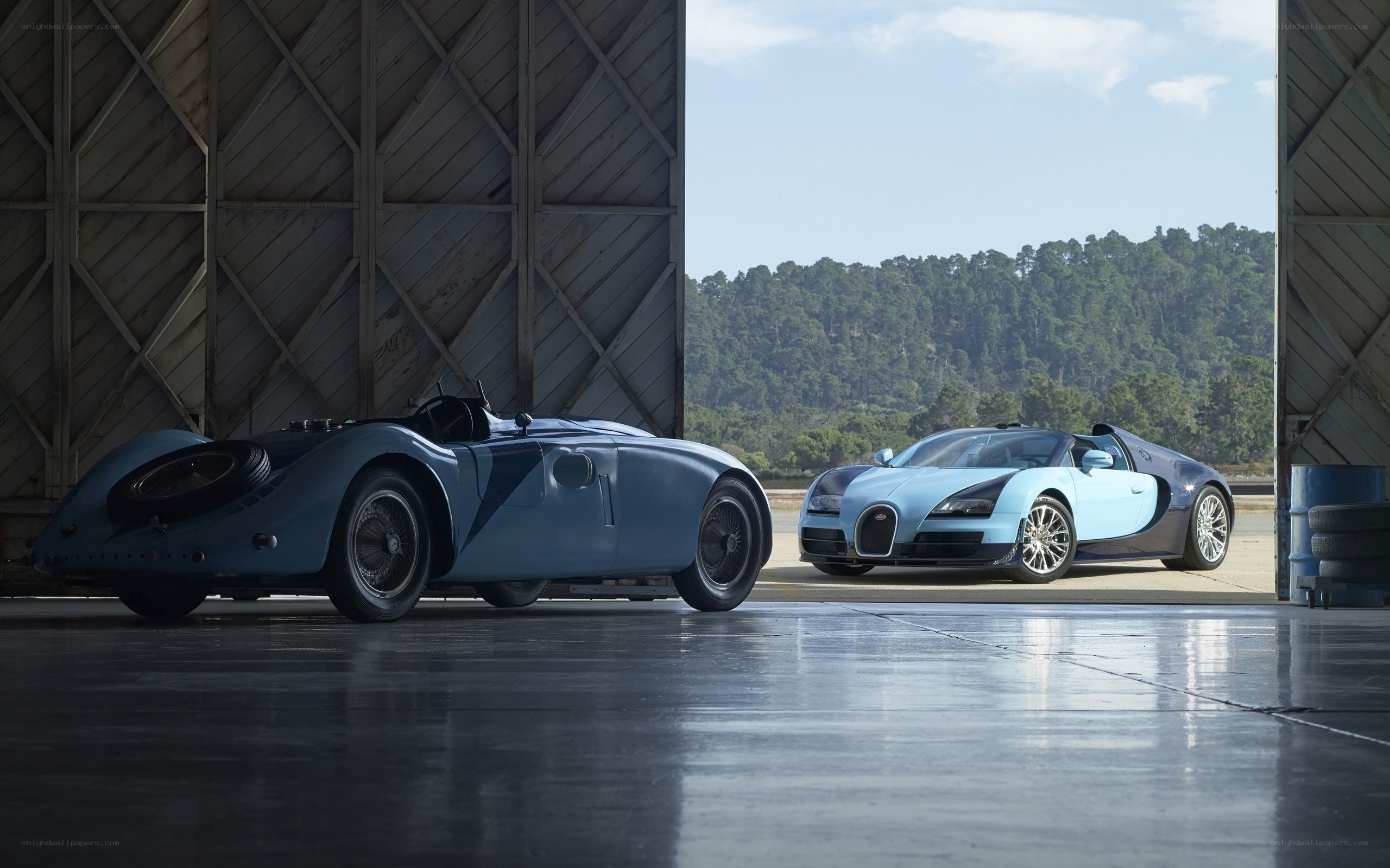 Bugatti cars in a hangar