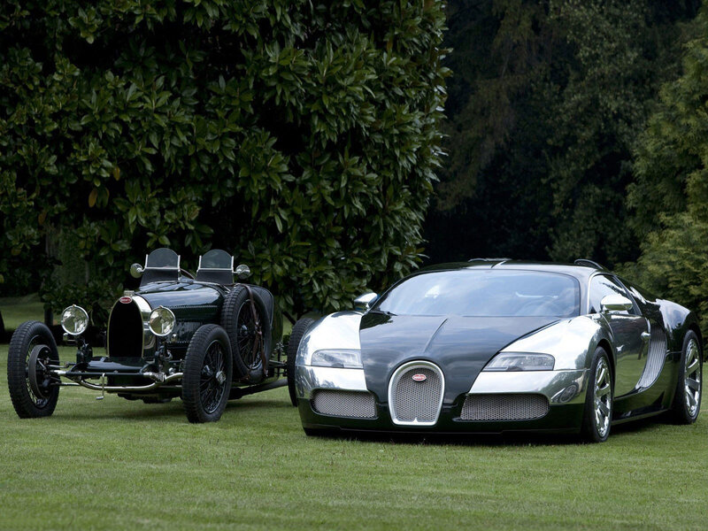 Bugatti cars on a lawn