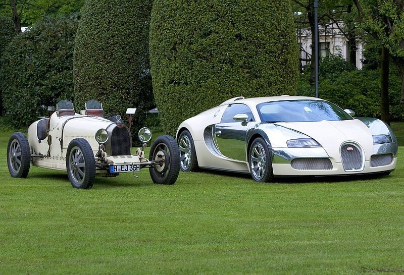 Bugatti cars on a lawn