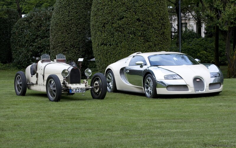 Bugatti cars on a lawn