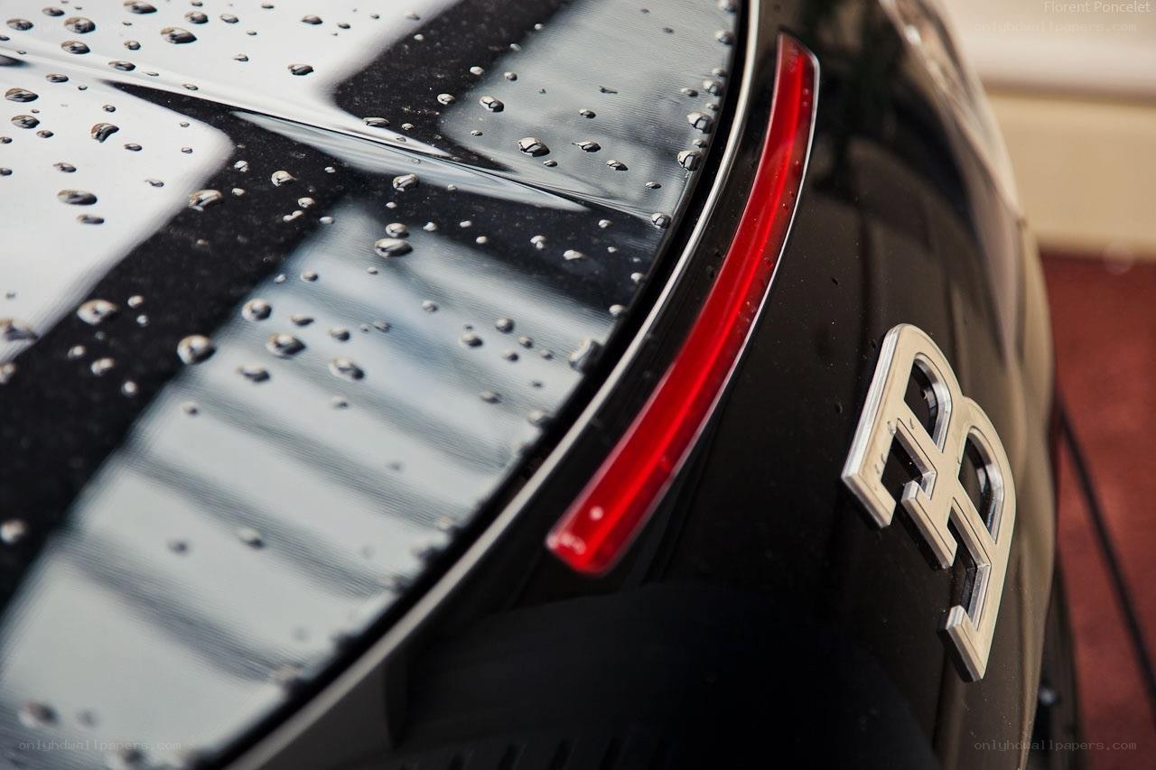 Bugatti logo on wet car
