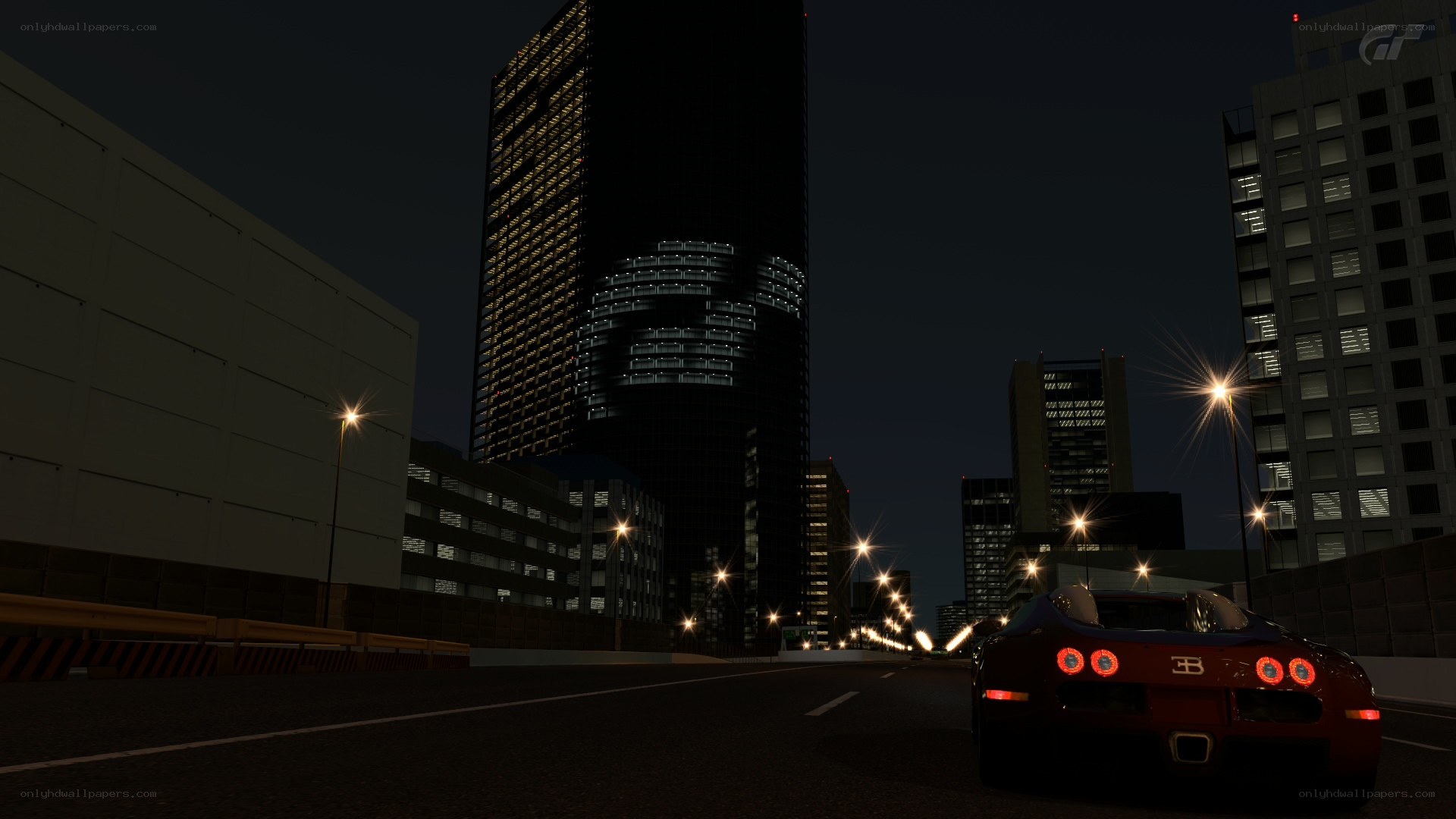 Bugatti on city street at night
