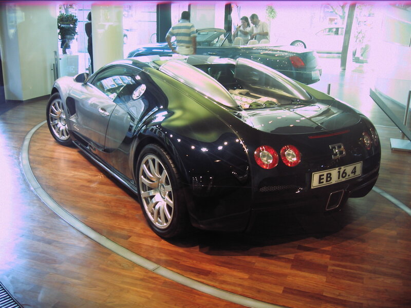 Bugatti Veyron Car — Black, Showroom, Photograph, Car Showroom