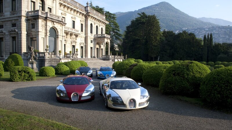 Bugatti Veyron cars at a mansion