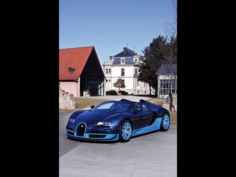 Bugatti Veyron in front of a mansion