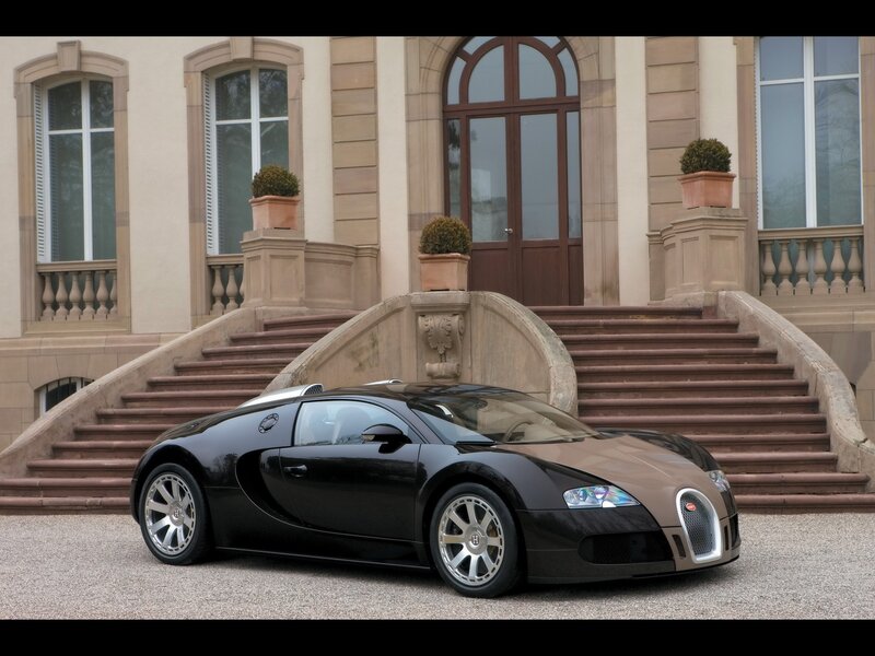 Bugatti Veyron in front of mansion