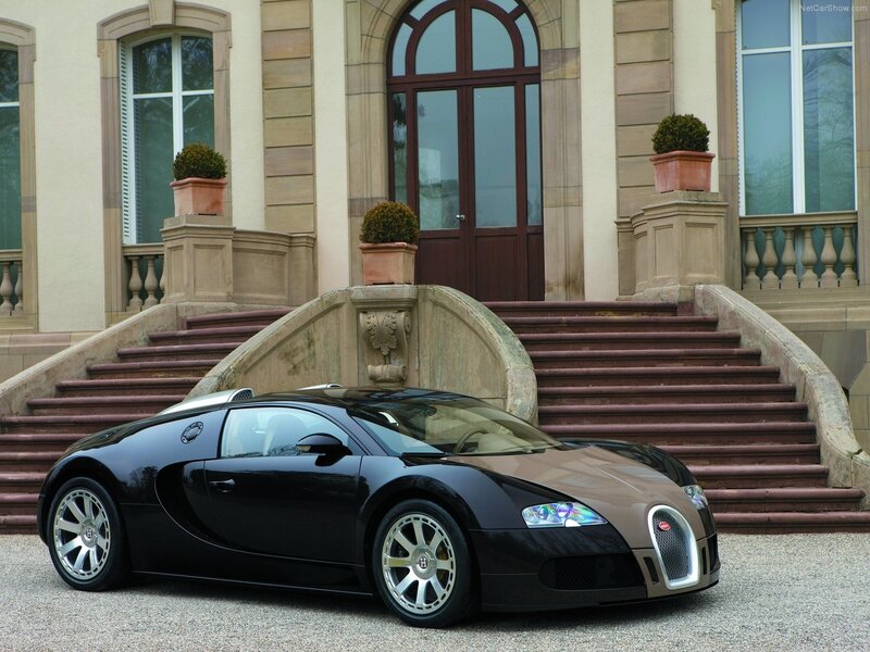 Bugatti Veyron in front of mansion