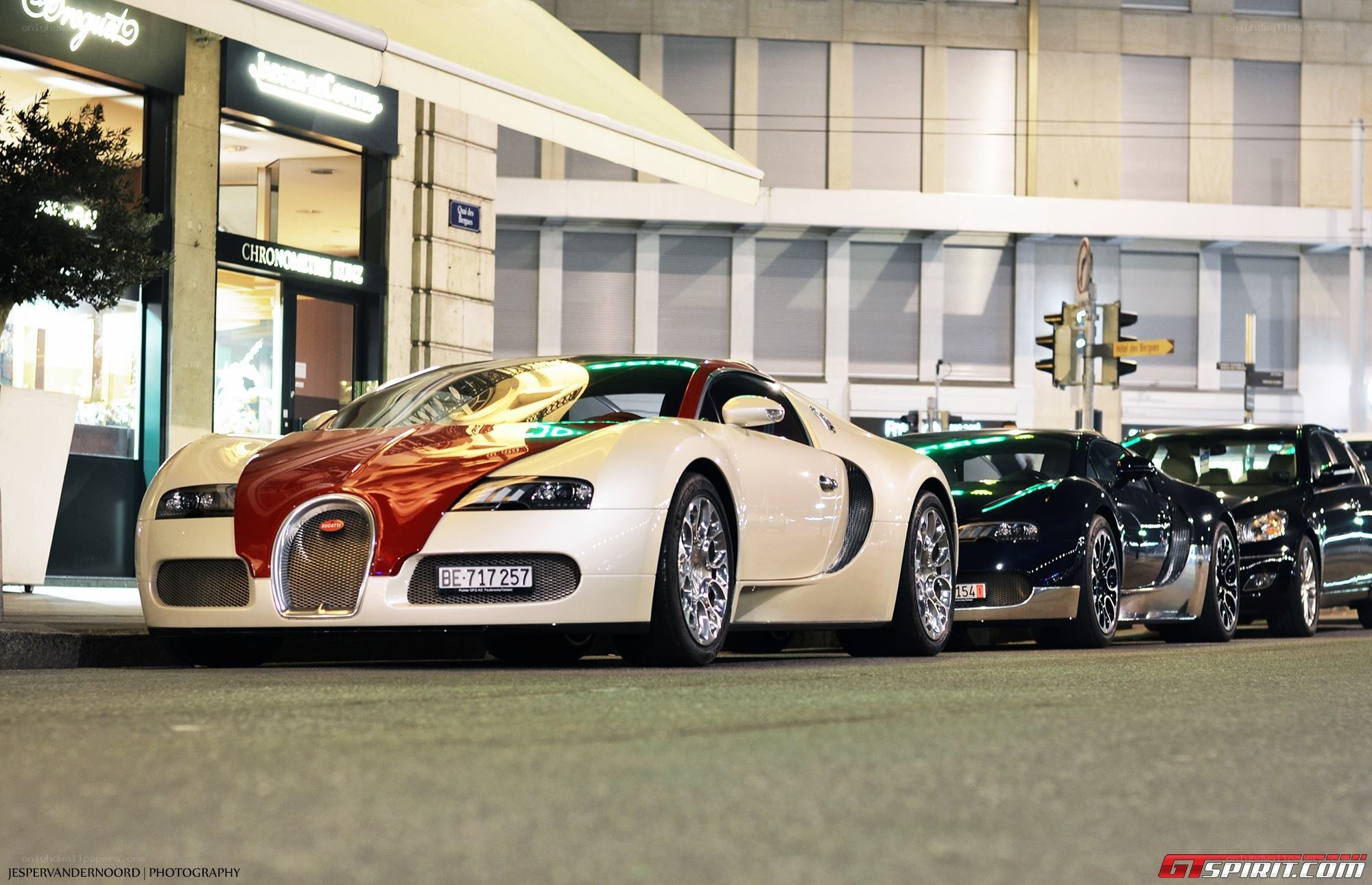 Bugatti Veyron lineup at night