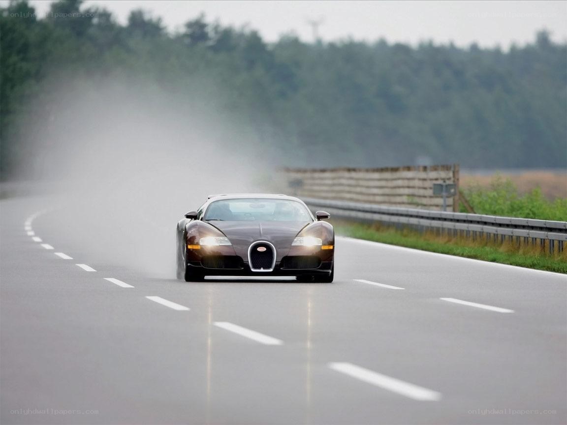 Bugatti Veyron on a wet road