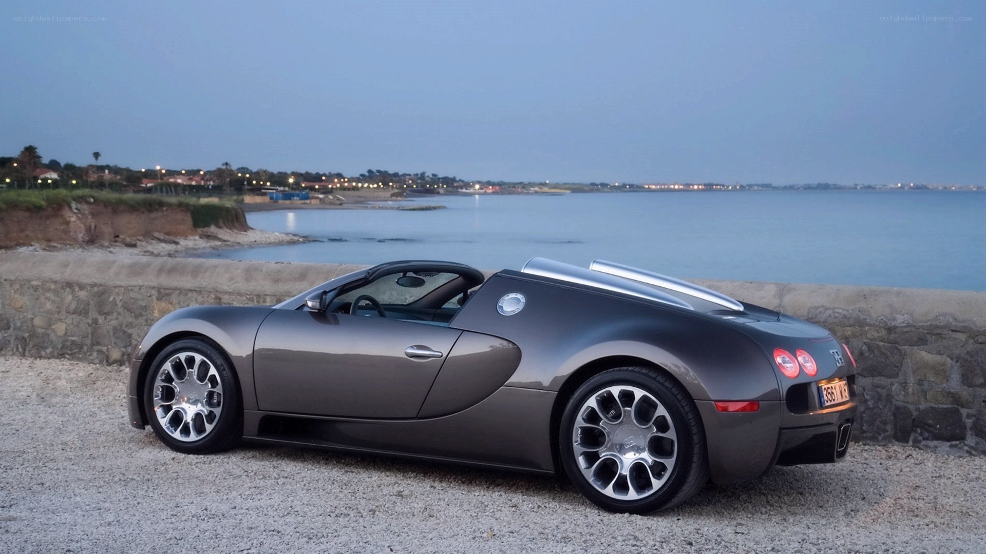 Bugatti Veyron parked by the sea