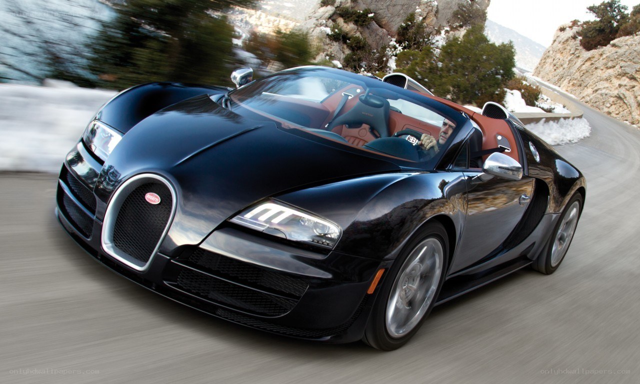 Bugatti Veyron speeding on mountain road