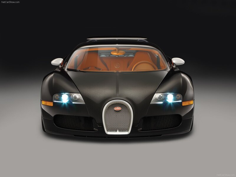 Bugatti Veyron Supercar — Black, Dramatic, Photograph, Carbon Fiber Body, Orange Interior