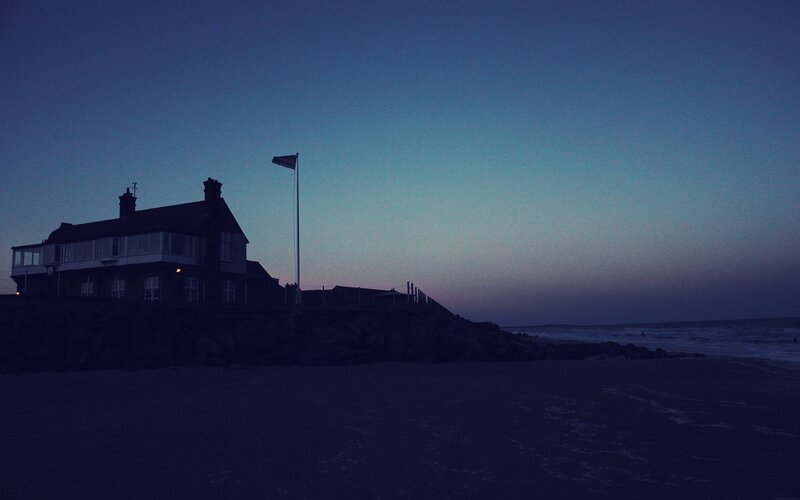 Building on Beach at Dusk