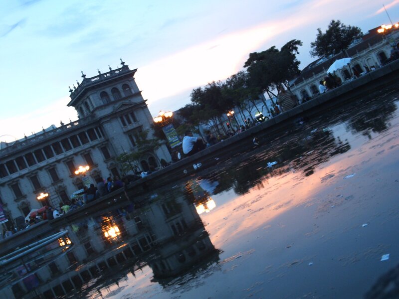 Building Reflected in Water — Blue