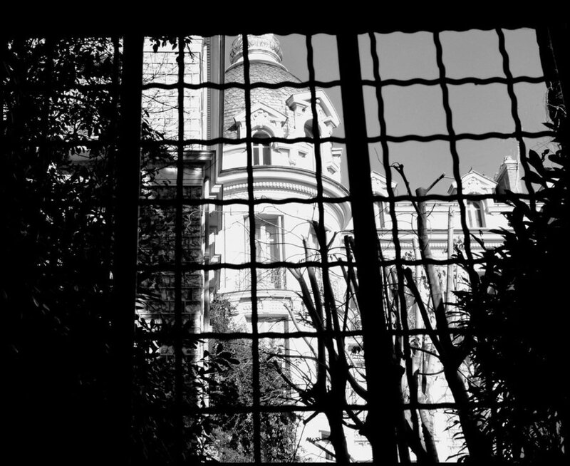 building through a wire fence