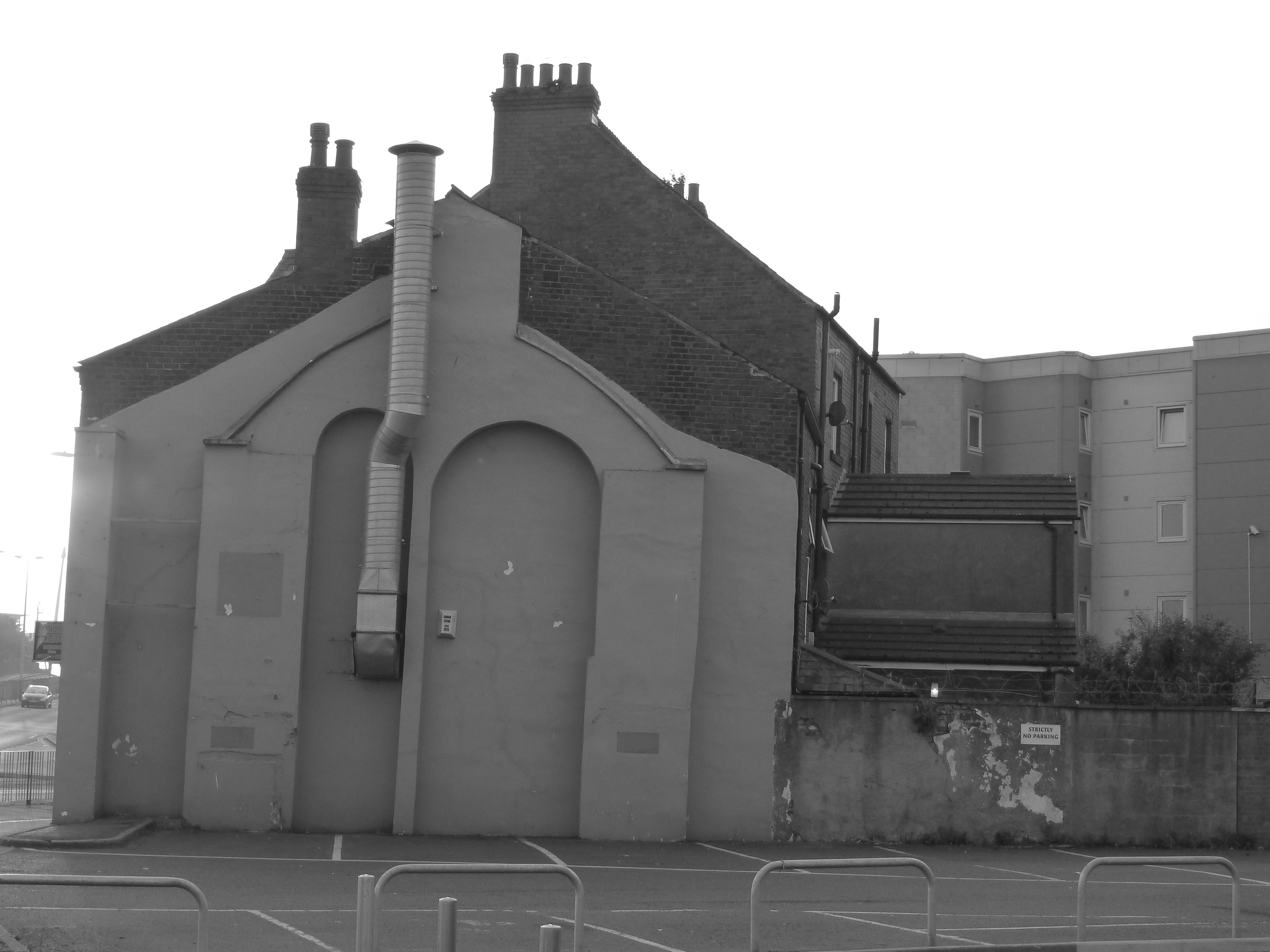 building with arched doors