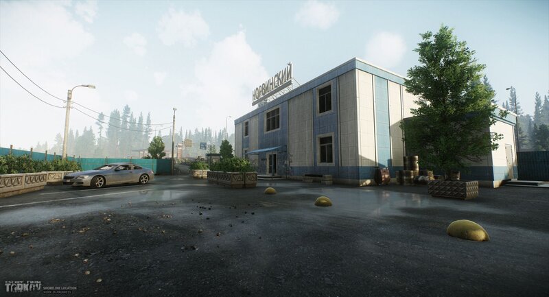 Building with Car in Parking Lot